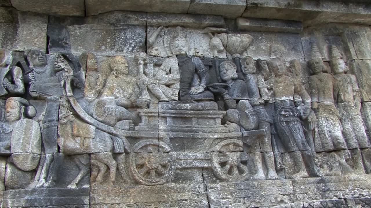Basso rilievo presso il Tempio di Borobudur, Sito Patrimonio dell'Umanità UNESCO, Giava Centrale, Indonesia, Tempio buddista.