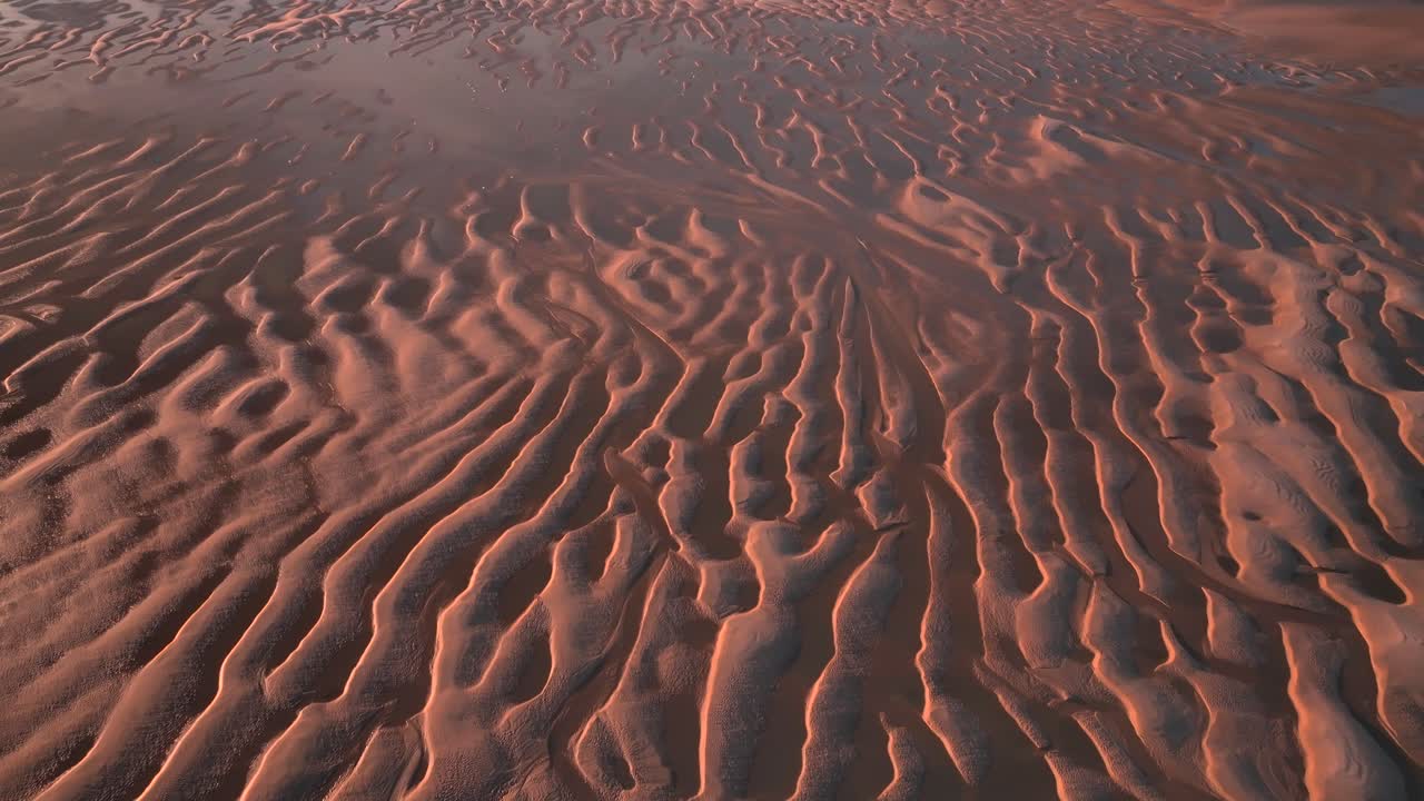 Intricate Patterns In Tidal Sand Flats With Sunset Light Illuminating The Scene. Fleetwood, Lancashire, UK