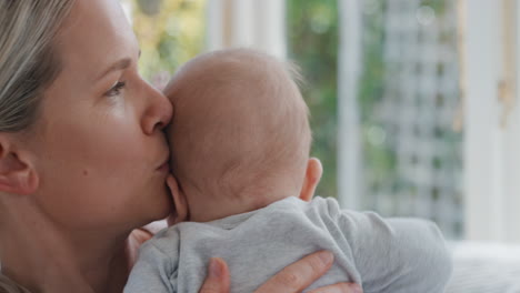 loving mother holding baby calming her newborn child mom gently soothing infant enjoying nurturing motherhood at home 4k