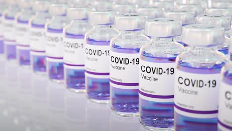 coronavirus covid -19 vaccine bottle. sars-cov-2. vaccine batch 3d rendering animation. seamless loop 4k