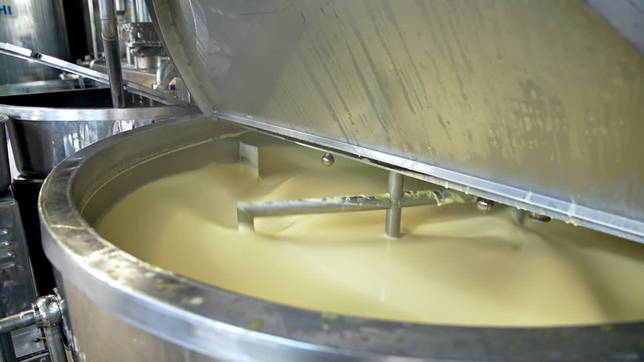 Butter production line at dairy industry. Close up view of butter production at dairy plant
