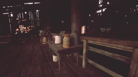 rustic barn interior with milk cans