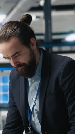 vertical video business administrator checking solar energy production systems