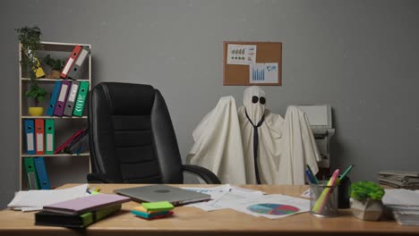 ghost at the office desk