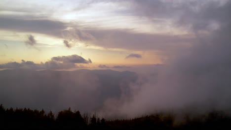fog clouds at sunset in appalachian and blue ridge mountain range aerial