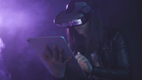 Unrecognizable-woman-in-VR-glasses-browsing-tablet