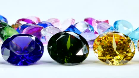 colorful gems on white background