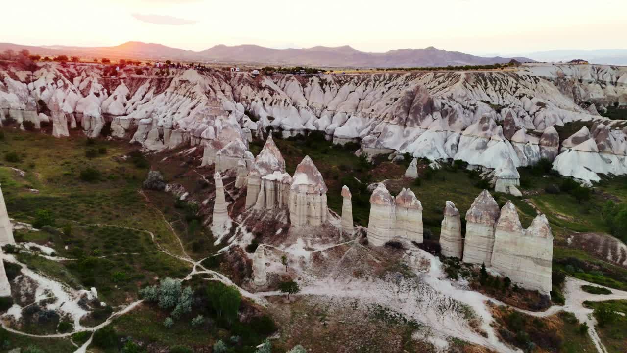 Aerial view of Cappadocia's unique rock formations at sunset, Turkey