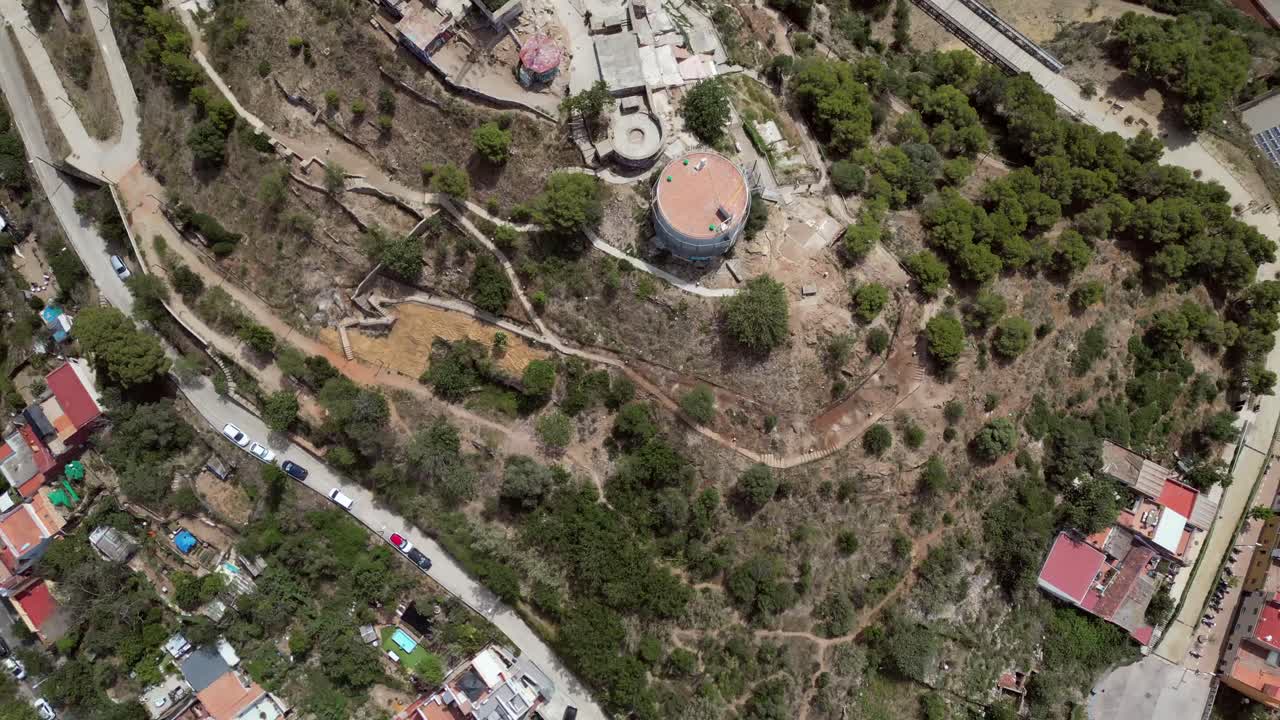 Cinematic wide-angle shots of Barcelona's cityscape with La Sagrada Familia Iconic tower in a distance