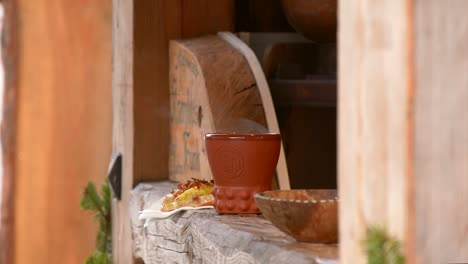 hot drink and snack on a ledge