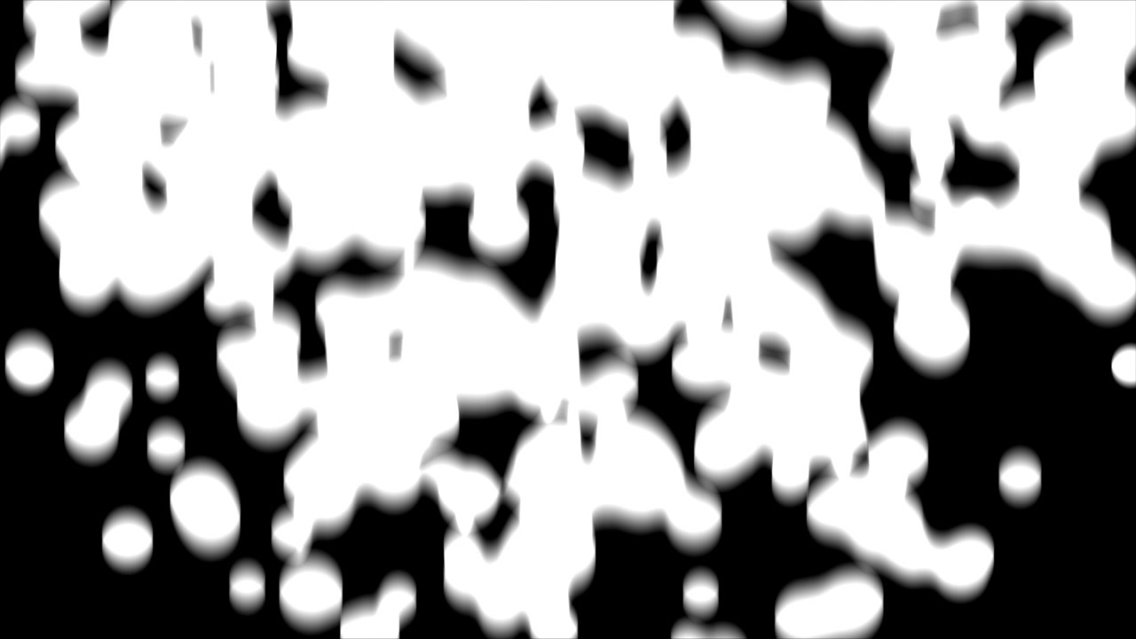 Goccioline liquide bianche astratte che si espandono su sfondo nero.