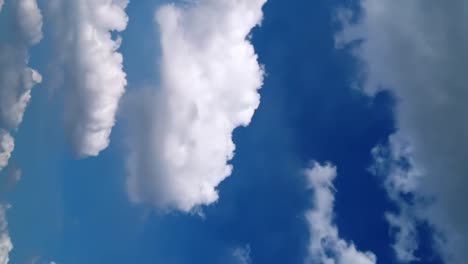 Seamless-loop-of-fluffy-clouds-in-a-blue-sky-in-a-summer-shot-on-a-clear-day