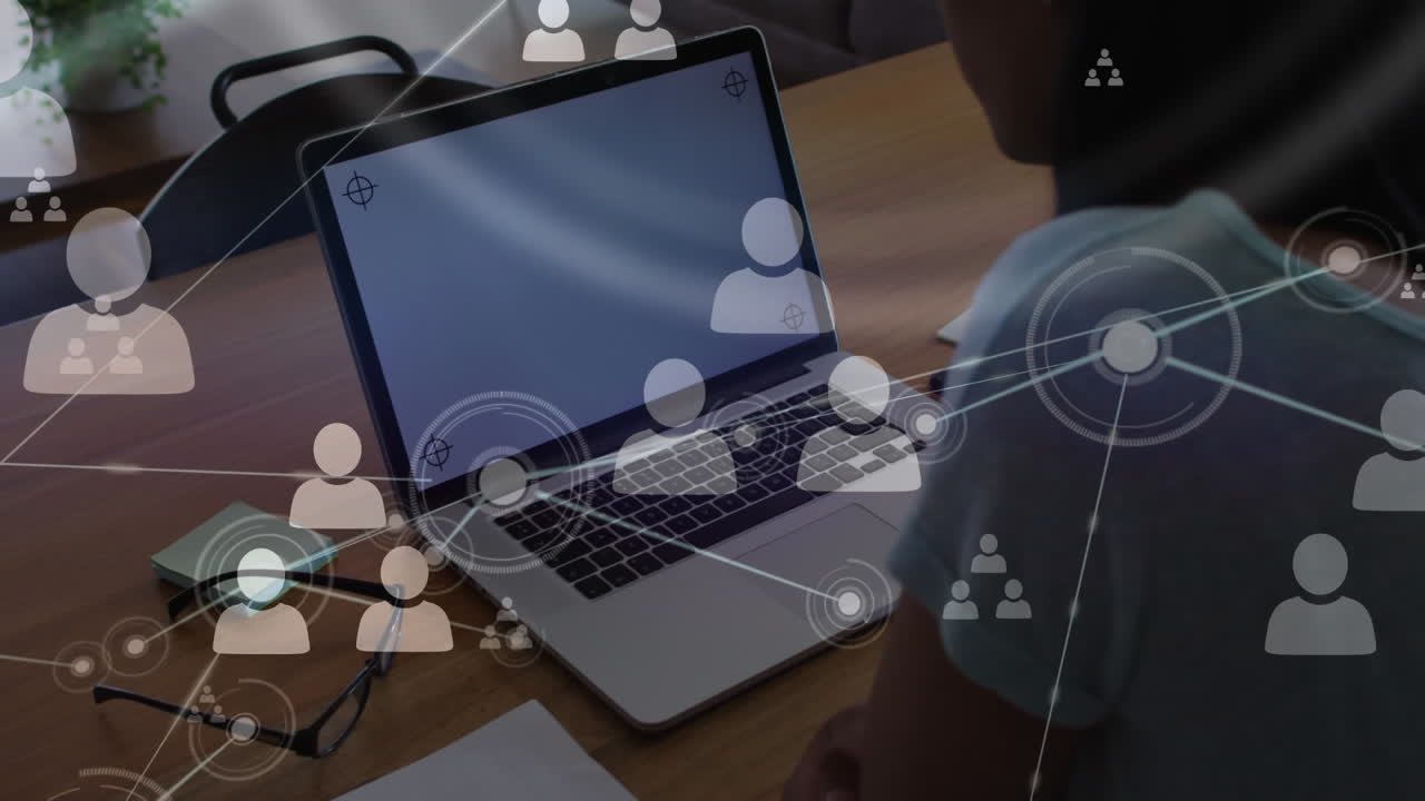 Animation of icons and data processing over woman using laptop