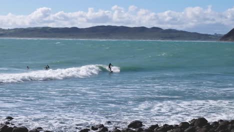 Surfing-in-Raglan,-New-Zealand