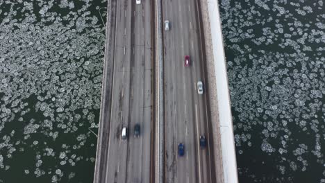 Rare-iceberg-circular-fungi-algae-bubbles-headed-west-at-a-birds-eye-view-over-a-quiet-vintage-Quesnel-bridge-traffic-North-and-South-over-the-North-Saskatchewan-River-Edmonton-Alberta-Canada-2-3