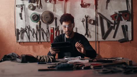 Craftsman working on a project in a metal workshop
