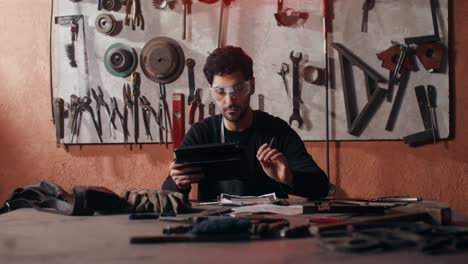 craftsman working on a project in a metal workshop