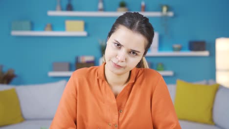 Portrait-of-unhappy-and-frustrated-young-entrepreneur-woman-in-home-office.