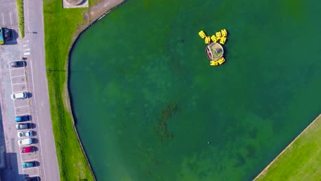 Descending-Aerial-Orbit-View-of-Dovercourt-Boating-Lake