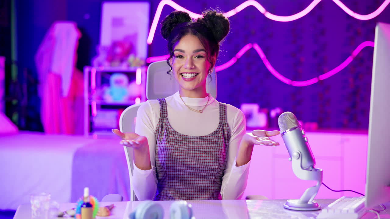 A woman streaming a podcast with neon lights in the background