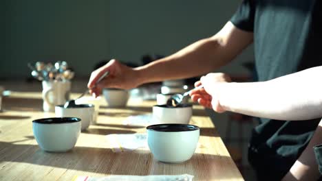 specialty coffee professionals coffee cupping session to taste the coffee quality.