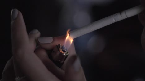 lighting a cigarette in slow motion