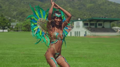 in the midst of trinidad's lively carnival celebrations, a young girl shines brightly in her vibrant costume