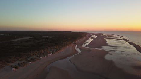 sunset at the dutch beach breezand in zeeland