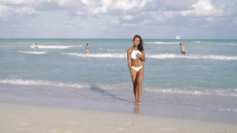 young fit black girl on seaside