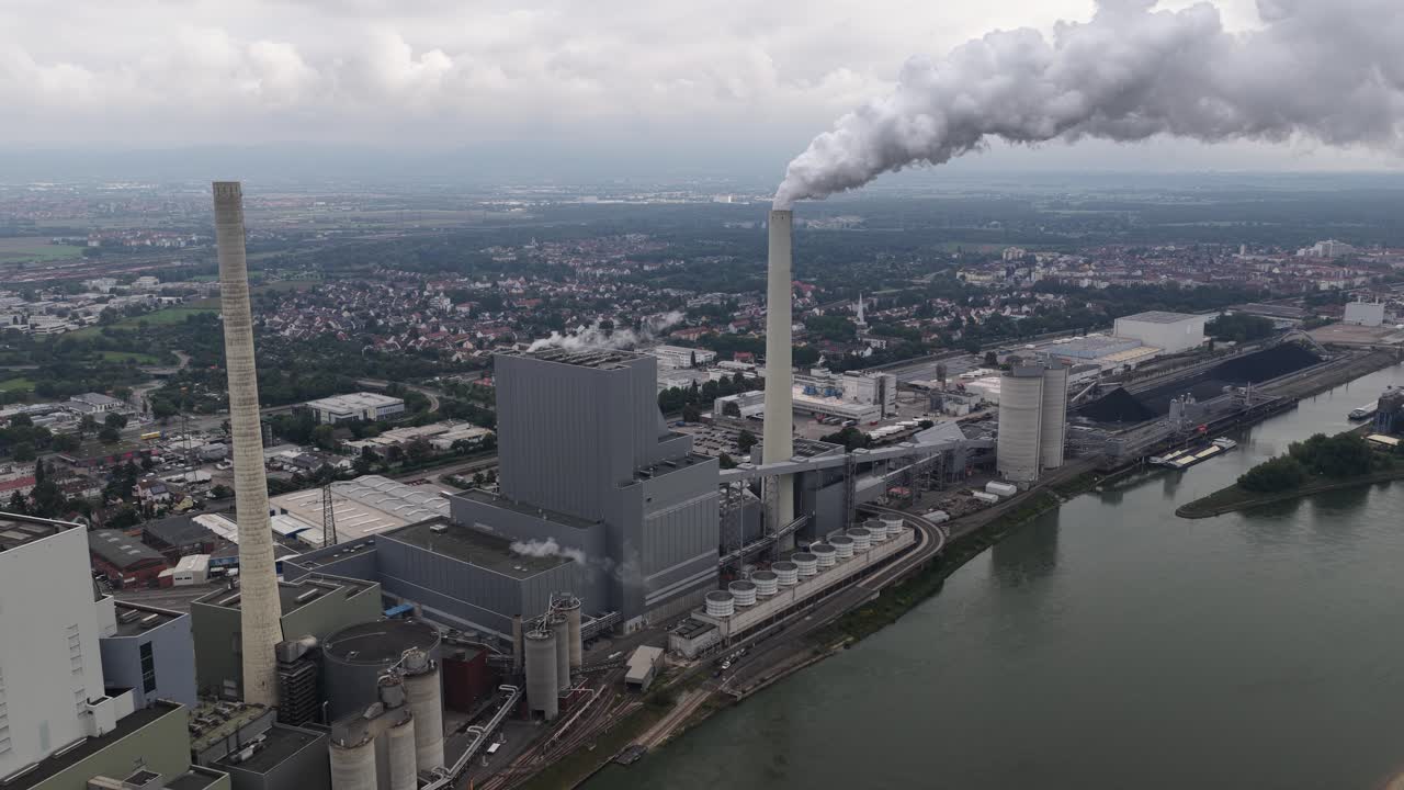 Power plant in Mannheim Germany. Smoking chimney, industrial facility. Aerial views