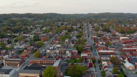 descending aerial of colorful historic small town in usa