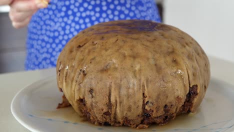 Pan-Around-Lighting-Match-On-Top-Of-Christmas-Pudding