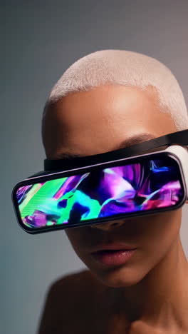 person wearing futuristic vr glasses with neon abstract display