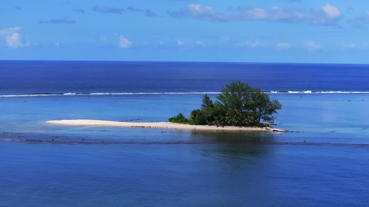 Lost lone island Papeete Tahiti Tapahi Moto Au Mahina Orafara Ahonu French Polynesia aerial drone turquoise water clear water barrier coral reef white sandy beach palm trees swim snorkel circle left