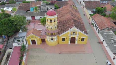 the magnificent facade of santa barbara church comes into full view. the intricate architectural details, from the ornate carvings to the grand entrance. roll left.