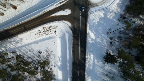 Top-Down-View-Of-Road-Junction-In-Rakowice,-Krakow,-Poland-During-Winter---aerial-drone-shot