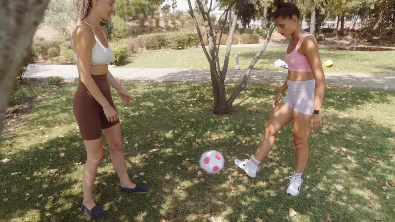Women Playing Soccer in the Park