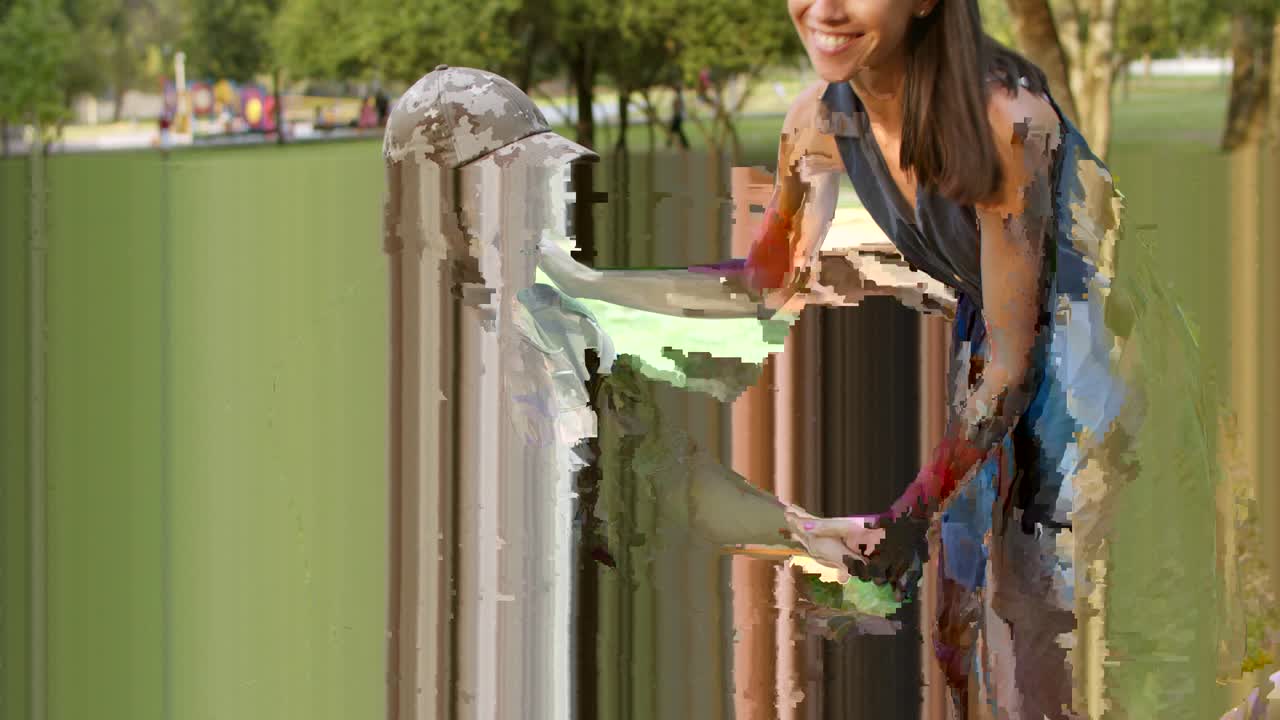 행복한 장애인 군인 남자와 그의 아내가 아이들과 함께 공원에서 시간을 즐기고 있습니다.