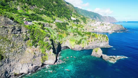 lush coastal area lining the atlantic ocean with rocks and calm crystal clear water