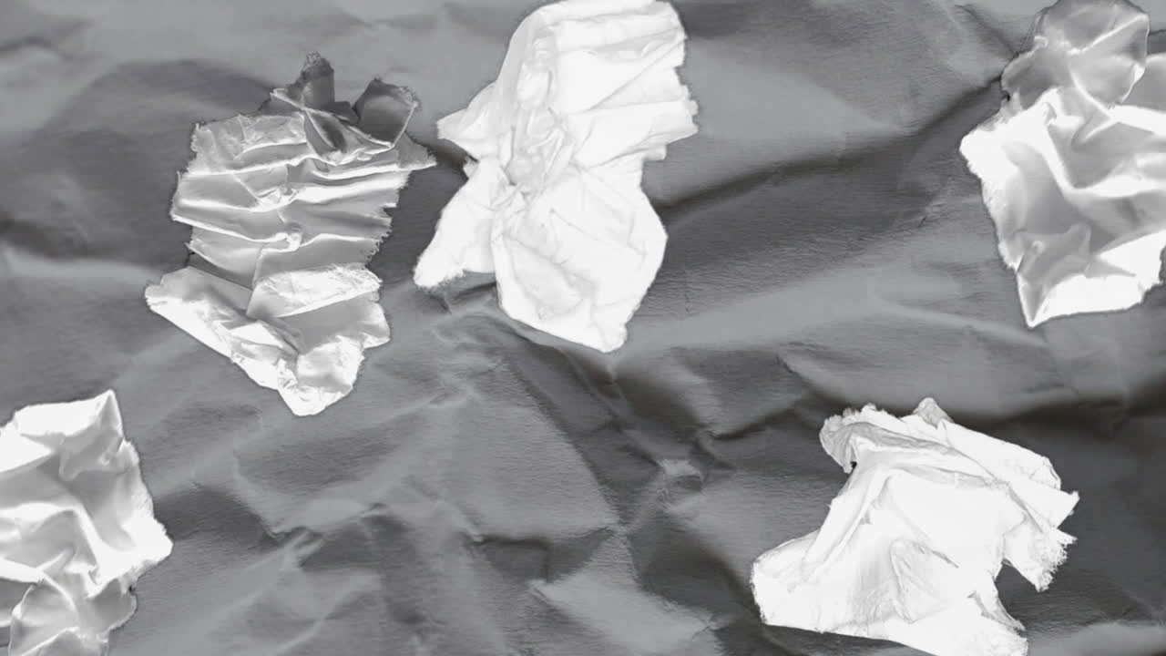 Stop Motion Animation of Crumpled and Torn Paper