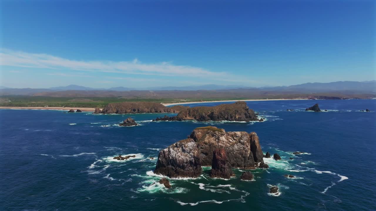 Rocky Islands Near Playa la Morita In Summer In Tenacatita, Jalisco, Mexico. - aerial shot