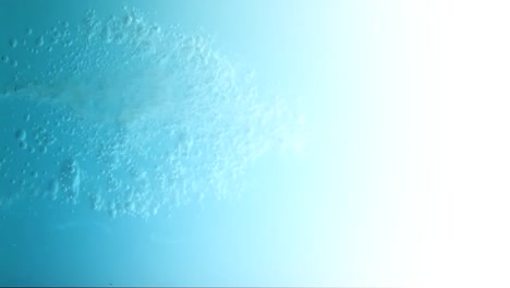 animation of flowing water creating bubbles over gradient background