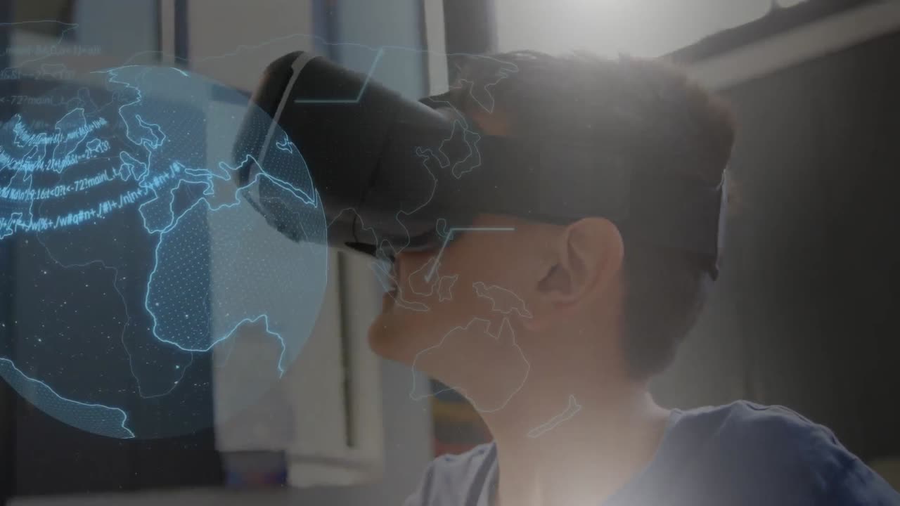 Boy using virtual reality headset and digital globe