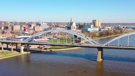 Good-drone-aerial-establishing-shot-of-Davenport-Quad-Cities-Iowa-and-the-Mississippi-River-foreground-1