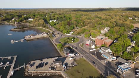 Aerial view of cars driving at roundabout in a coastal American town