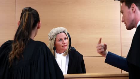 lawyers speaking with the judge