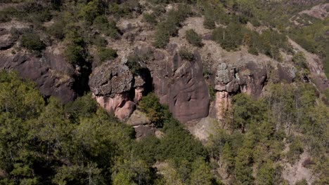 beautiful chinese rocky mountainside in remote landscape, aerial arc shot