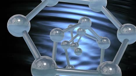 animation of micro of molecules models over grey background