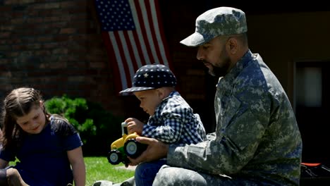 military man spending time with family