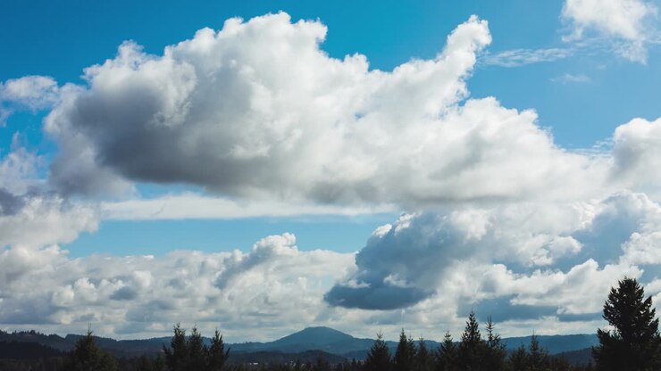 Majestic Clouds Floating Over Mountain Time Lapse